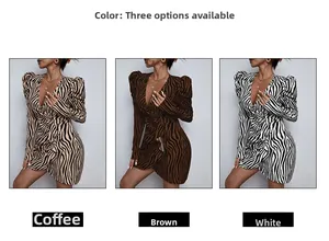 Zebra print V-neck dress detail in coffee brown and white with puff sleeves