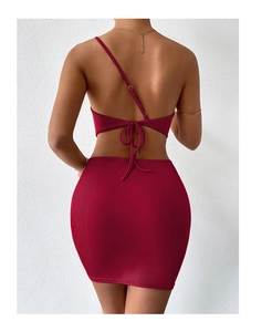 Rear view of red ribbed knit two-piece set featuring one-shoulder backless tie top