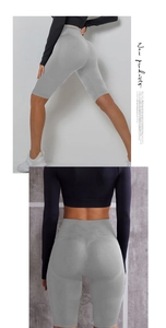 Detailansicht der nahtlosen High-Waist Yoga-Shorts in Hellgrau mit Fokus auf Passform