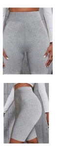 Detailansichten grauer nahtloser Yoga-Shorts mit hoher Taille und gerippter Stoffstruktur