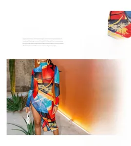 Detail view of the side high slit and vibrant abstract print on a long sleeve slim dress