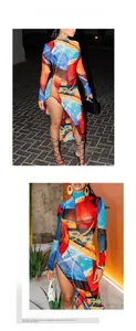 Close-up of abstract print dress featuring vibrant patterns and a thigh-high side slit
