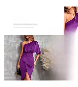 Detail of purple satin one-shoulder dress with elegant pleats and thigh-high side slit