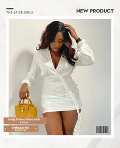 Detail of white mini dress with ruched texture, lapel collar, and drawstring waist elements