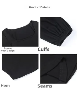 Close-up of black U-neck top detailing square neckline cuffs hem and stitching quality
