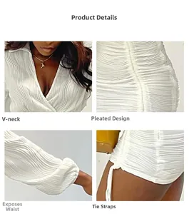 Detail of white V-neck dress with textured ruched fabric and drawstring tie hem