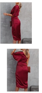Detail view of burgundy satin midi dress with elegant one-shoulder ruffle sleeve design