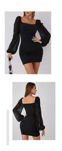 Close-up of elegant square neck black dress with mesh lantern sleeves and ruching detail
