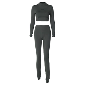 Women's 2-piece grey sports set with long sleeve crop top and high waist yoga leggings