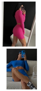 Detail of ribbed knit long sleeve crop top and high waist shorts in pink and navy colors
