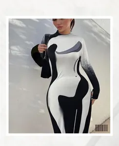Detail of slim fit long sleeve dress showing high neck and abstract black white print