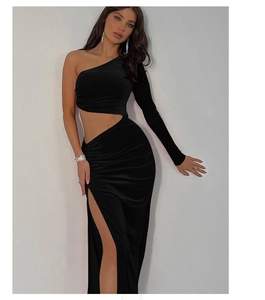 Detail of velvet one-shoulder dress with side cutout and elegant high-slit long skirt
