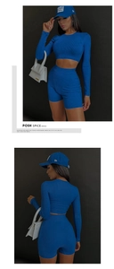 Front and back view of royal blue ribbed long sleeve crop top and matching shorts set