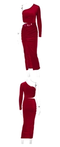 Detailed close-up of dark red velvet evening dress featuring side slit and ruched design