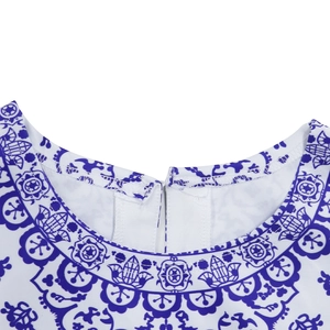 Macro detail of round neckline with ethnic mandala print and fine sewing craftsmanship
