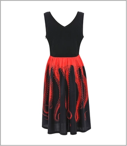 Detail showing the red and black octopus tentacle print on the vintage flare dress hem