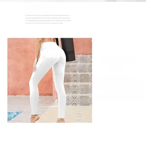 Close-up of white high-waisted yoga pants featuring functional side pockets for gym workouts