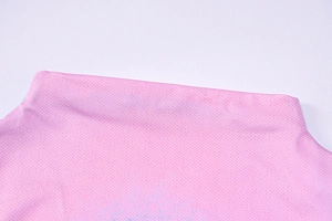 Detailed macro view of the pink 3D print dress neck and breathable mesh fabric texture