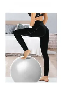 Close-up of black high-waisted yoga leggings featuring side pockets and butt-lifting seams