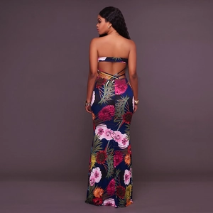 Floral print backless maxi dress with criss-cross straps and deep blue floral pattern