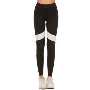 High-waist fitness leggings with black and white color-block and mesh patchwork panels