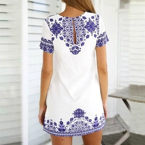 Ethnic print white mini dress with blue mandala patterns and back cutout detail