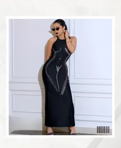 Detail of a black halter maxi dress featuring a sparkling rhinestone body contour design