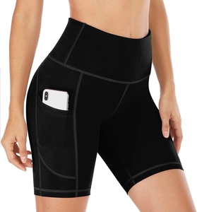 Close-up detail of high waist yoga shorts with a side pocket for smartphone storage