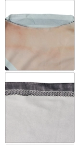 Detail of high-quality double-needle stitching and overlock seams on printed knit dress