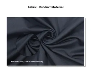 Detailed view of the soft milk silk fabric texture of the black spaghetti strap top