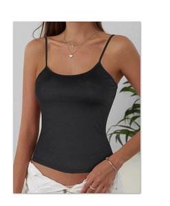 Detailed view of the slim spaghetti straps and flattering U-neckline on a black camisole