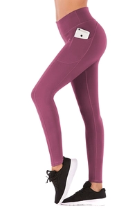 Detail view of high waisted yoga leggings featuring a functional side pocket for a smartphone