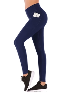 Detail view of high-waisted yoga leggings with functional side pocket for phone storage