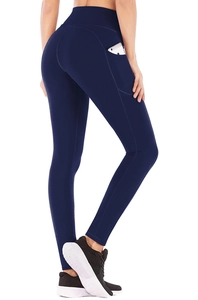 Detail shot of high-waisted yoga leggings with a side pocket holding a mobile phone