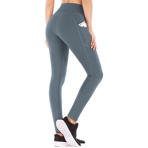 Detail view of high waisted yoga leggings featuring a functional side pocket for a smartphone