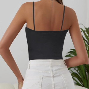 Slim strap black tank top with backless design shown from a back view on a model