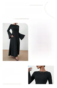Detail of elegant black dress showing bell sleeves and slim fit tailored waistline