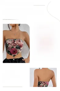 Dettaglio del top a bustino floreale con stampa di rose rosa e orlo a punta