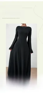 Detailed close-up showing the elegant backless tie design of this black long-sleeve maxi dress