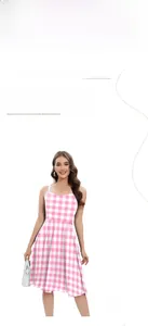 Macro detail of pink plaid fabric and digital printing on the Barbie-style dress