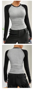 Detail view of long sleeve colorblock tee with side drawstring ruching and contrast sleeves