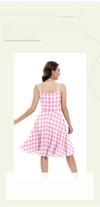 Detailed back view of pink gingham dress featuring an open back and hidden zipper closure