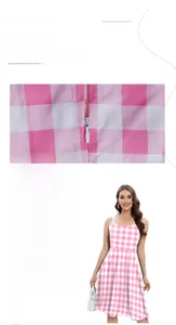 Detail view of the pink gingham dress featuring hidden zipper and digital print fabric texture