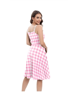 Detail of pink plaid dress showing high waist cut and A-line skirt on model