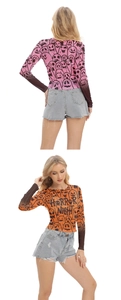 Vista fronte e retro della maglia a maniche lunghe in mesh con graffiti Halloween e testo