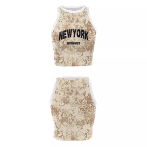 Women's two-piece camo crop top and skirt set with New York print on white background