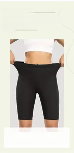Dettaglio dei pantaloncini sauna neri a vita alta con effetto sollevamento glutei e pancia