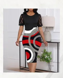 Detail view of stylish geometric print dress with mesh dot puff sleeves and slim bodice