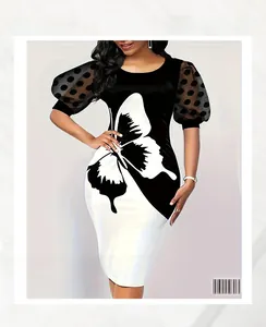 Detail of butterfly print pattern on a mesh puff sleeve bodycon midi dress