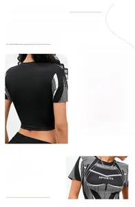 Dettaglio del crop top sportivo nero con stampe geometriche bianche e colletto con zip